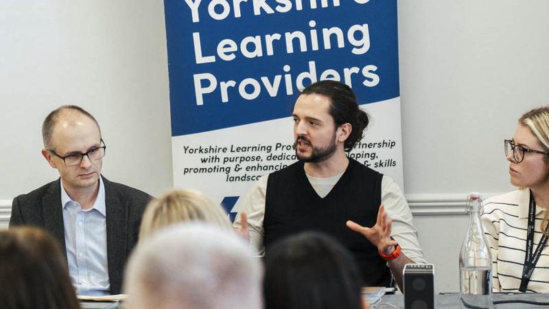 Group discussion at a Novus event supporting collaboration across education and industry