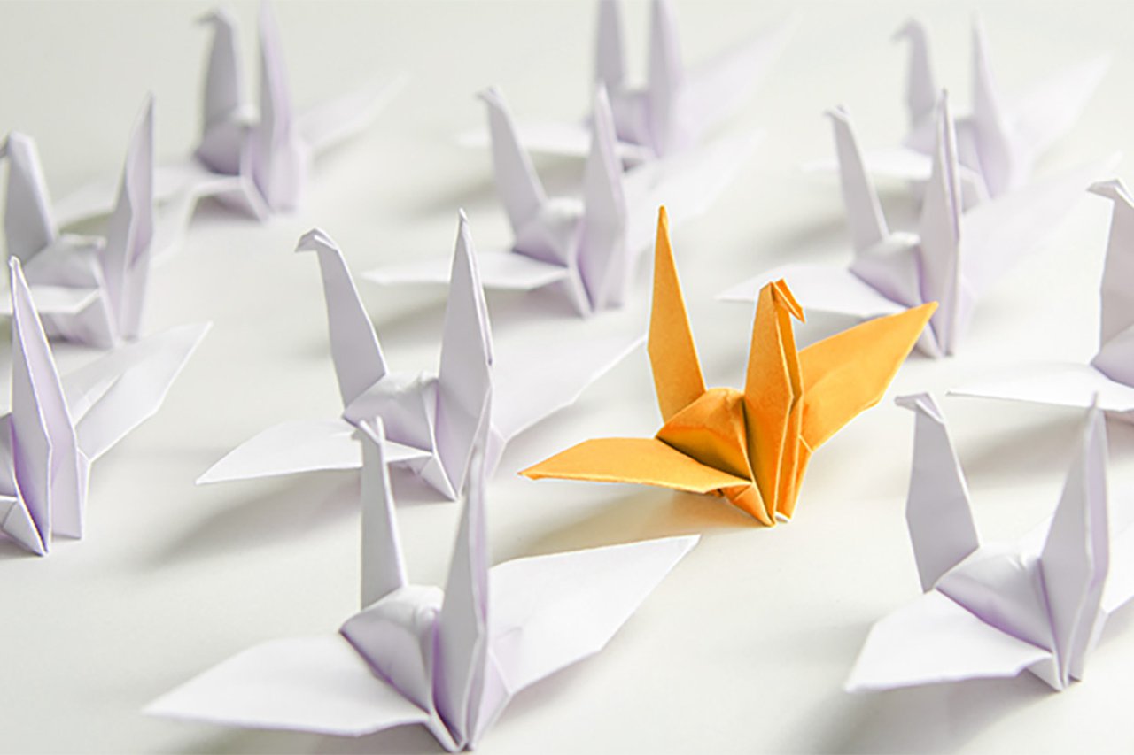 A line of origami swans
