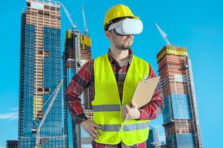 Man wearing a VR headset on a contruction site