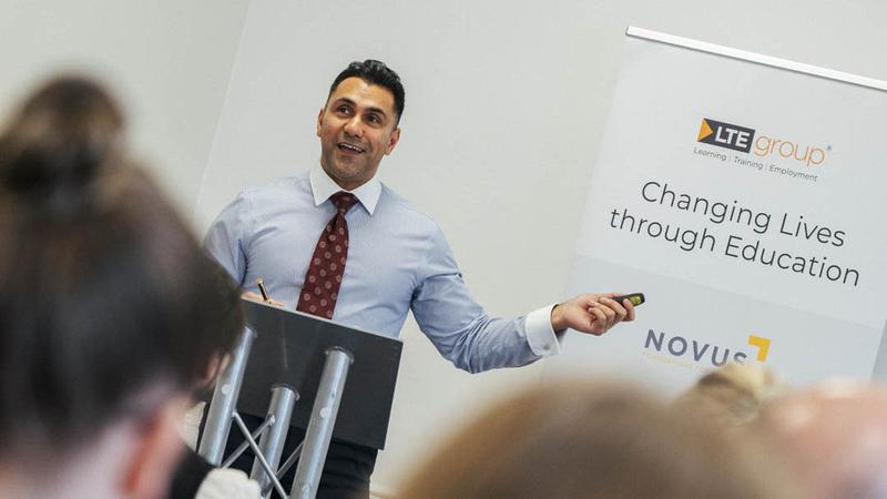 Speaker presenting at a Novus partner event on prison education, employment and training in Yorkshire