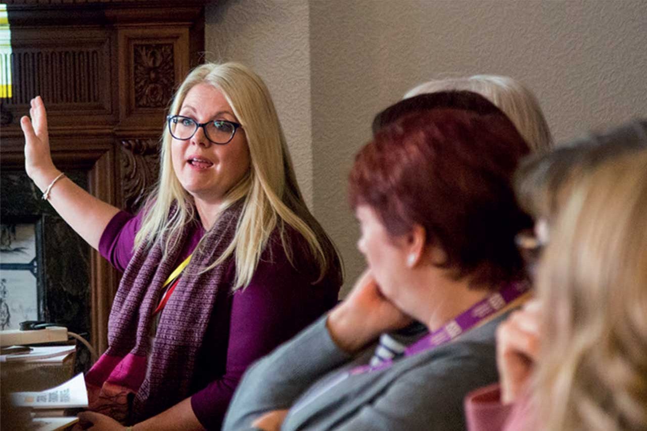 A group of woman talking together