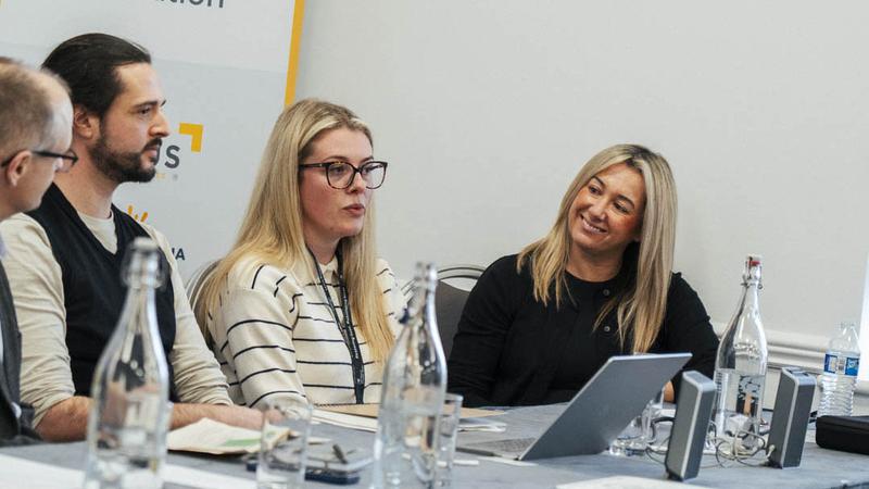 Collaboration between partners at a Novus event addressing rehabilitation through education