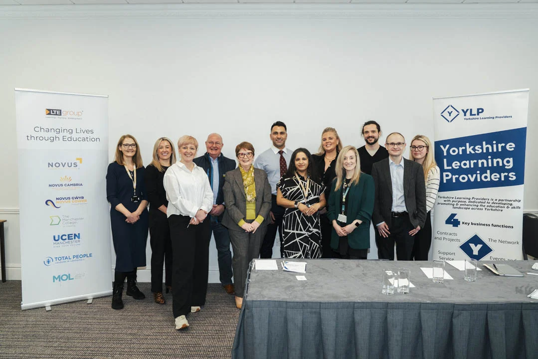 Group photo of panel participants at a Novus partner event focused on prison education, employment and training in Yorkshire