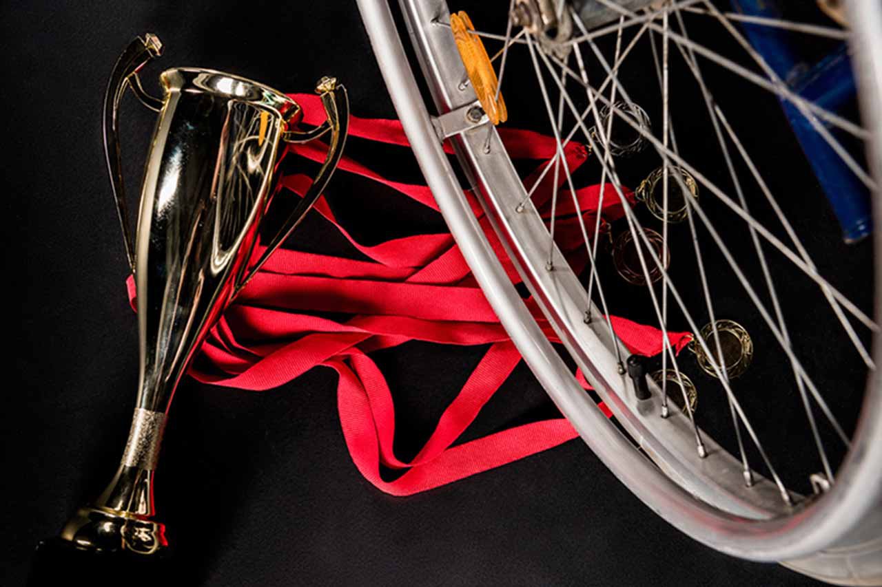 Close-up on a wheelchair and a trophy