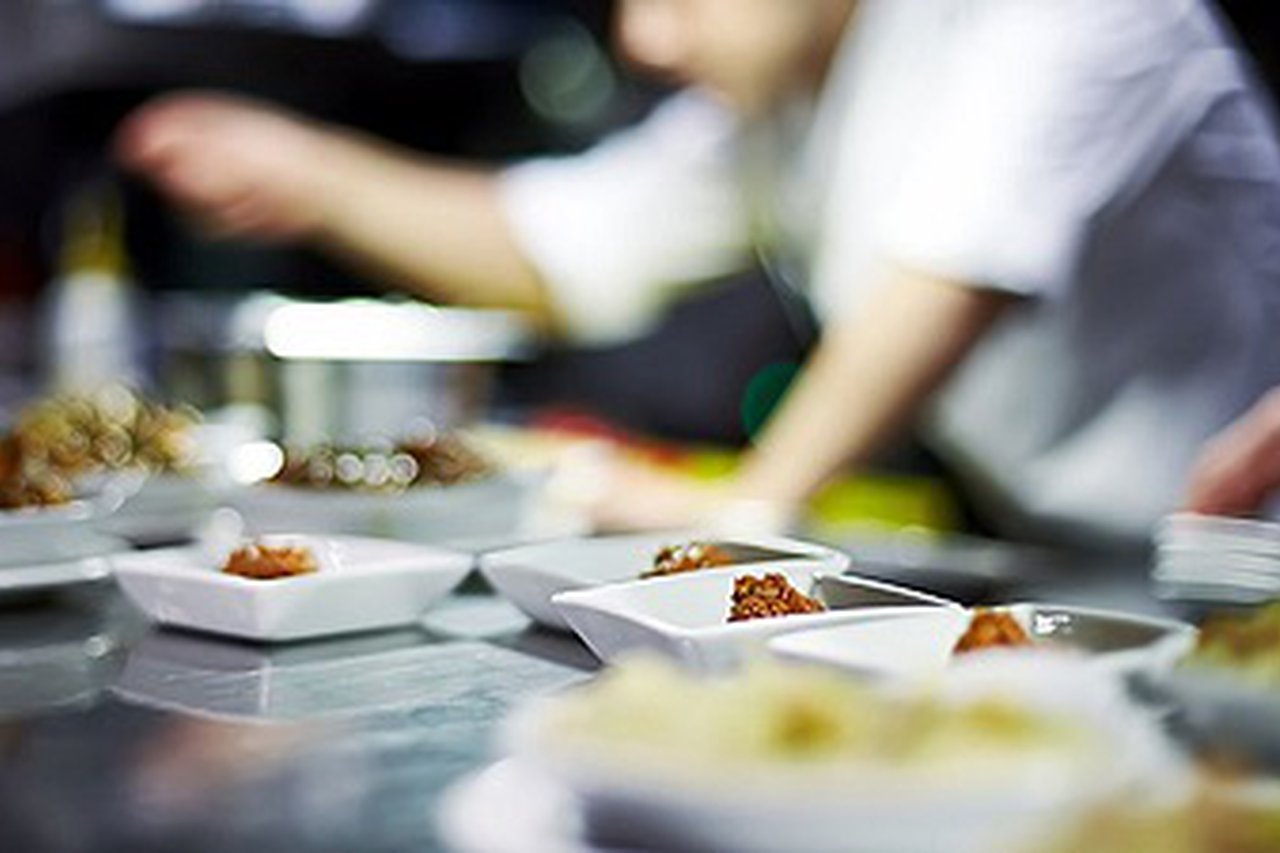 Plating up food in catering setting