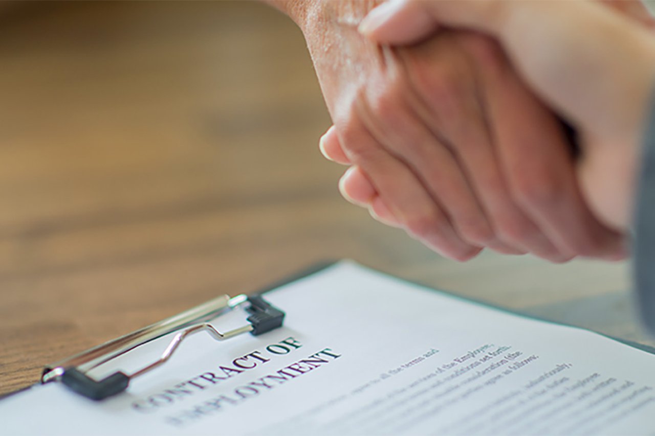 Two people shaking hands