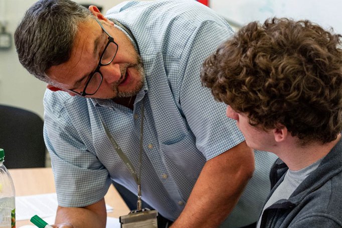 A tutor talking to a learner