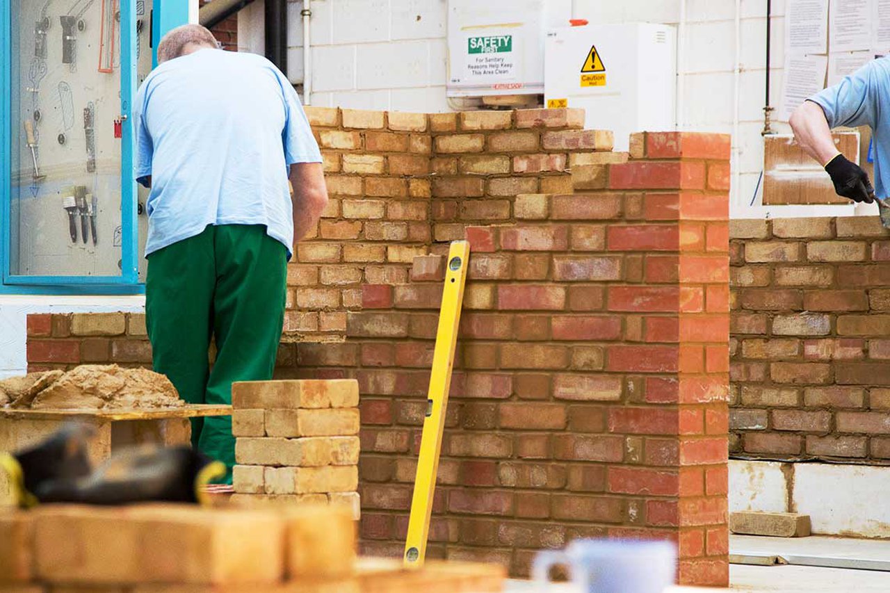 People building a wall