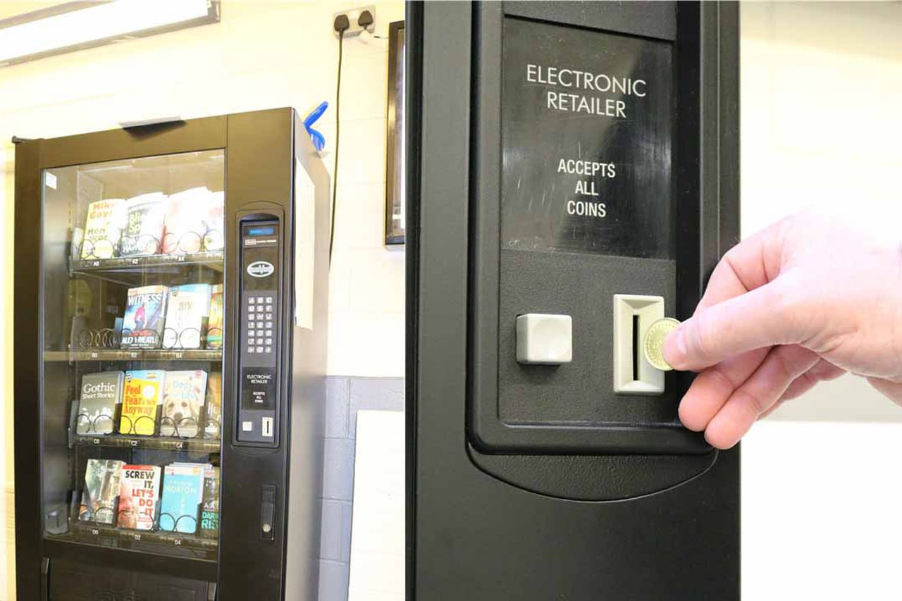 Inserting coin into vending machine