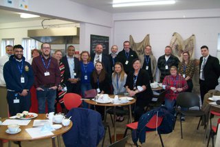 Group of people from Marston's visiting prison education setting