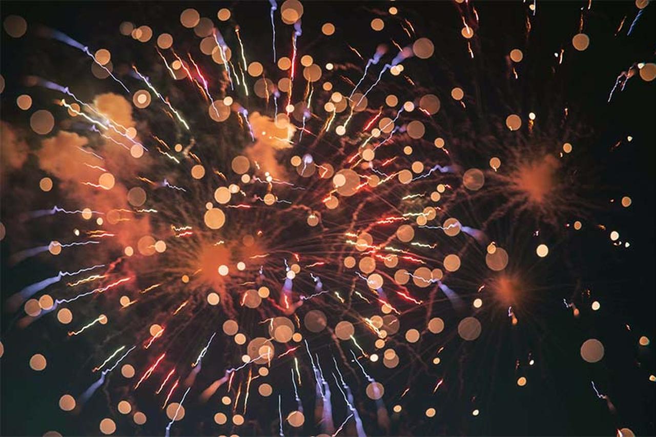 Fire works exploding in the night sky