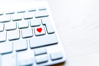 Keyboard with a heart over the enter button