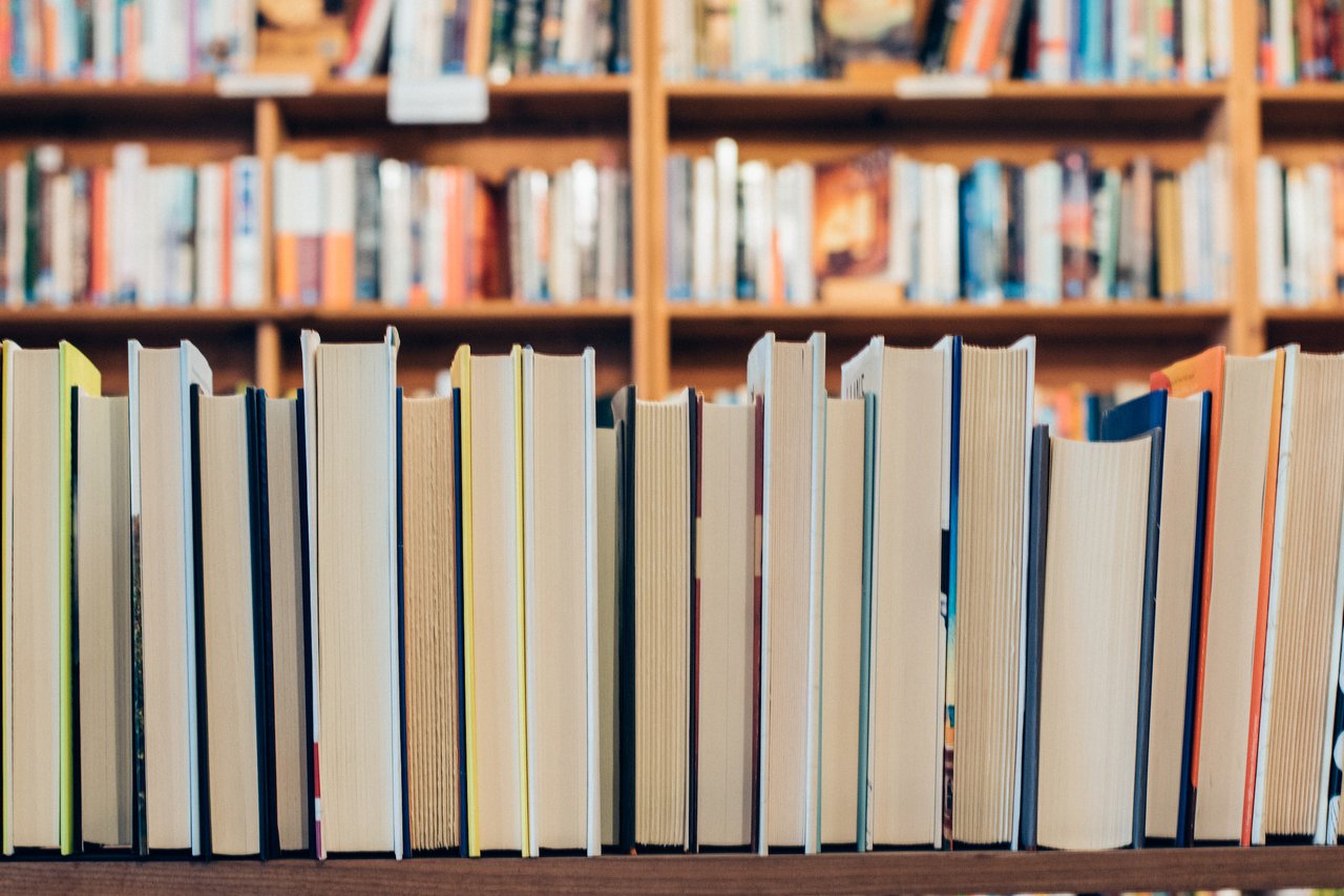 books stacked on their sides in a library