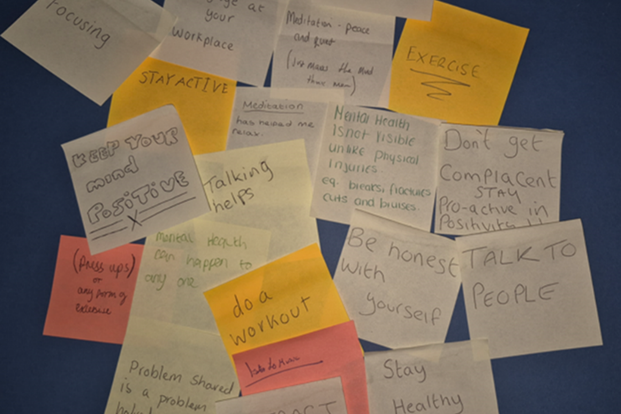 An assortment of different coloured post it notes with mental health and wellbeing advice written on each one from the learners perspective at HMP Hindley