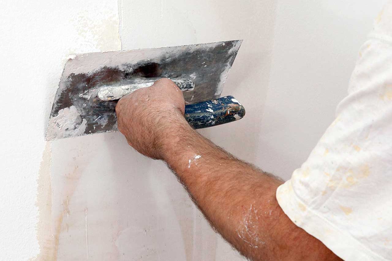 A wall being plastered