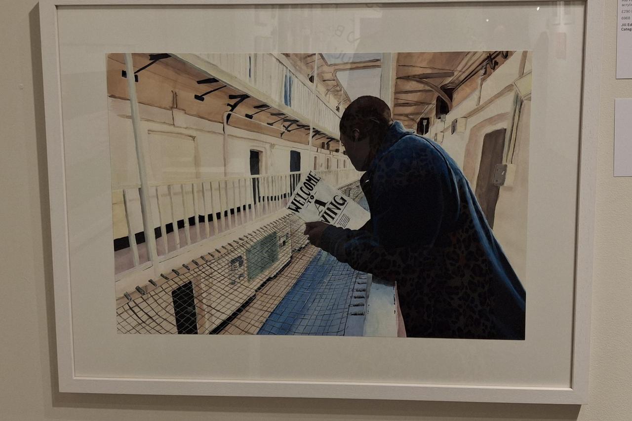Painting of a man in prison looking over a wing