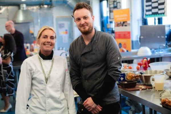 Novus prison education teaching staff wearing chefs uniforms