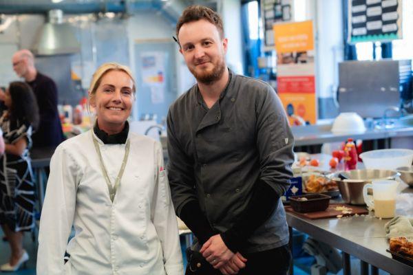 Novus prison education teaching staff wearing chefs uniforms