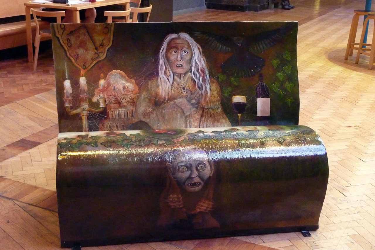 Bench covered in gothic artwork