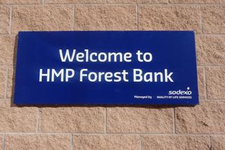 Sign saying Welcome to HMP Forest Bank