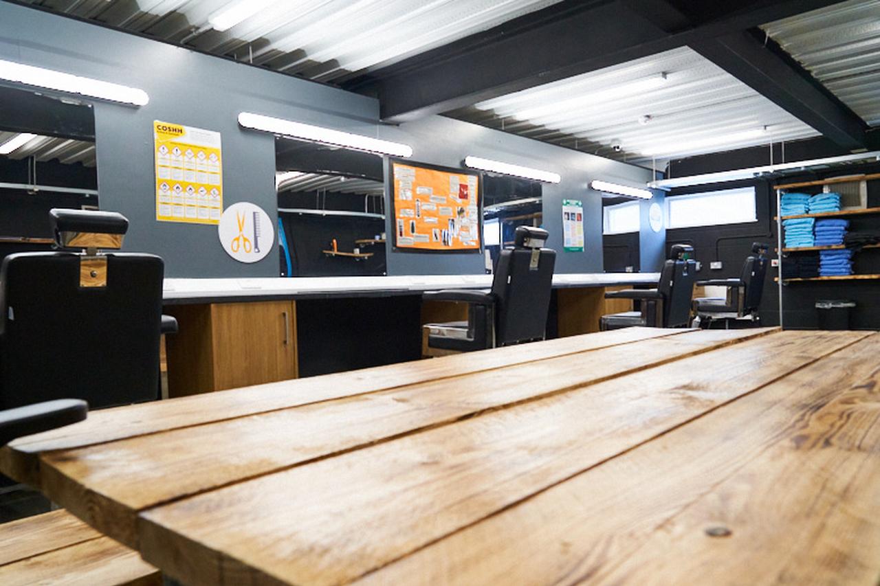 Wide shot of a Novus barbering facility